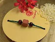 Terracotta ❂ Handmade . Rakhi { a }